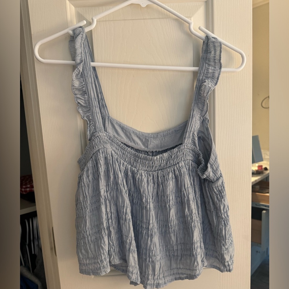 Ruffle blue top
